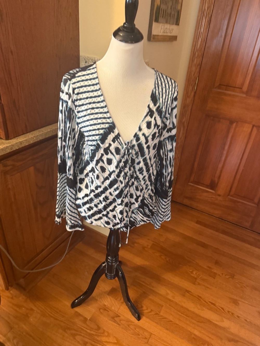 Wrap  and tie, draped  blouse.
